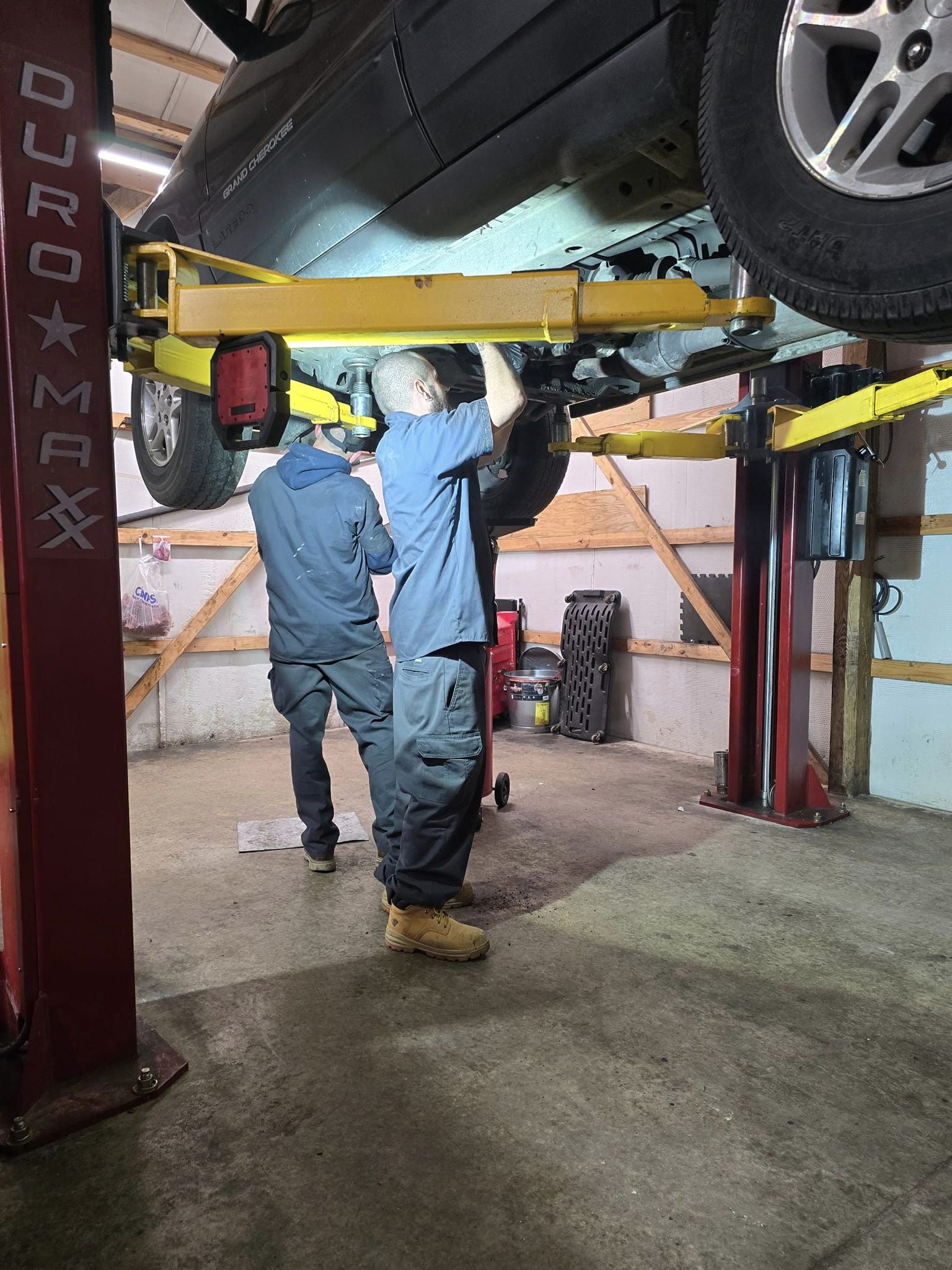 Two mechanics working